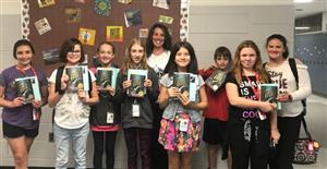 Group of students with books 